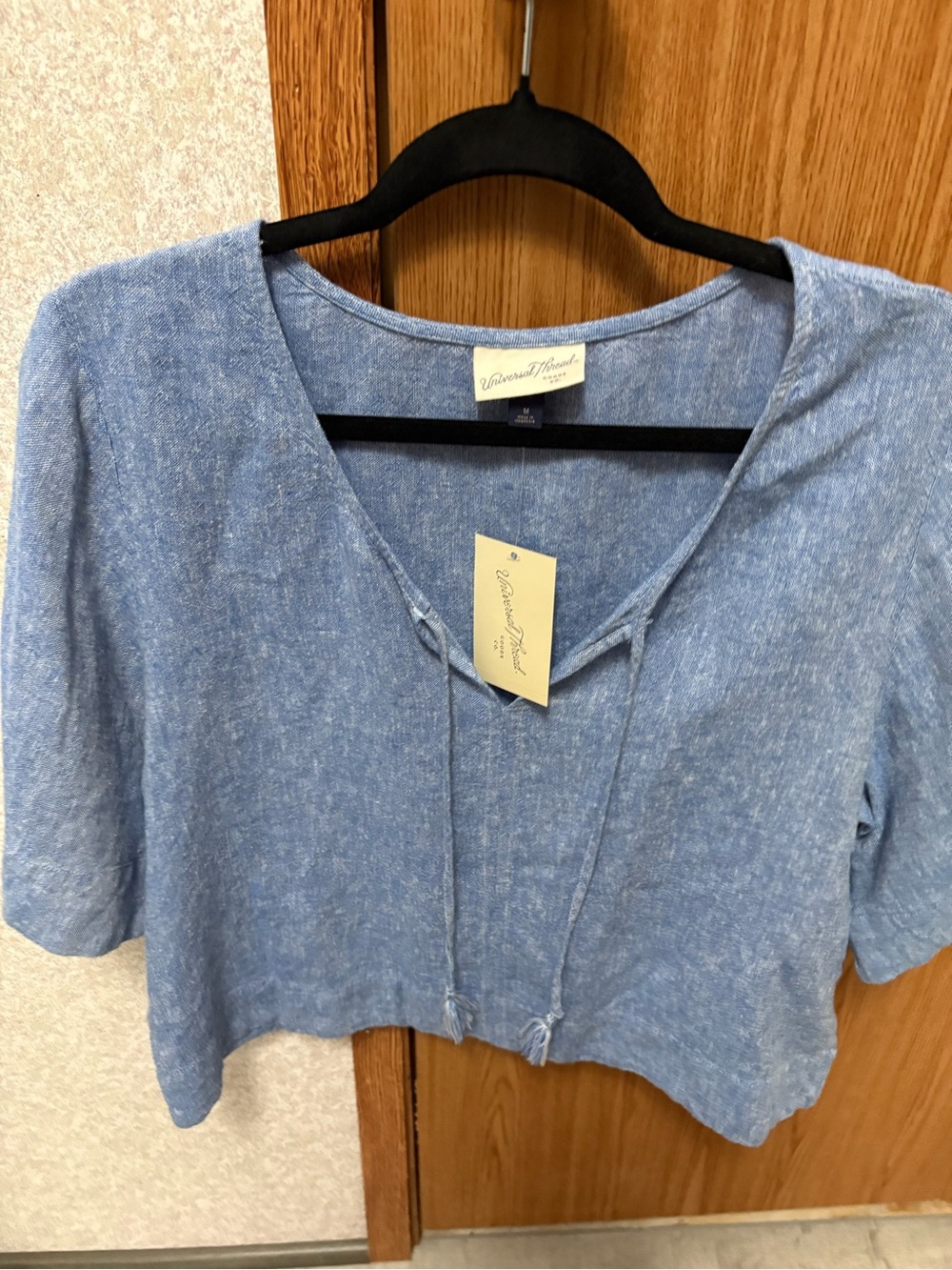 Linen blue shirt new with tags. By A new day target brand.